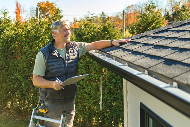 Professional Hail Damage Roof Repair technician working in Normal, IL